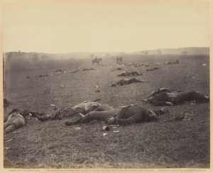 A Harvest of Death; Timothy H. O'Sullivan, American, about 1840 - 1882, Print by Alexander Gardner, American, born Scotland, 1821 - 1882; negative July 4, 1863; print 1866; Albumen silver print; Image: 17.8 x 22.1 cm (7 x 8 11/16 in.), Mount: 30.5 x 39.1 cm (12 x 15 3/8 in.); 84.XO.1232.1.36
