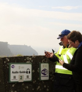 Cliffs of Moher Visitor Experience Director Katherine Webster and Cliffs Ranger Michael Hayes pictured using the new audio app