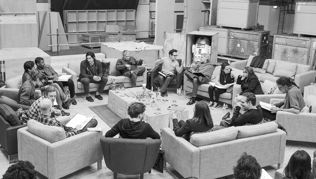 April 29th, Pinewood Studios, UK - Writer/Director/Producer J.J Abrams (top center right) at the cast read-through of Star Wars Episode VII at Pinewood Studios with (clockwise from right) Harrison Ford, Daisy Ridley, Carrie Fisher, Peter Mayhew, Producer Bryan Burk, Lucasfilm President and Producer Kathleen Kennedy, Domhnall Gleeson, Anthony Daniels, Mark Hamill, Andy Serkis, Oscar Isaac, John Boyega, Adam Driver and Writer Lawrence Kasdan. Copyright and Photo Credit: David James.