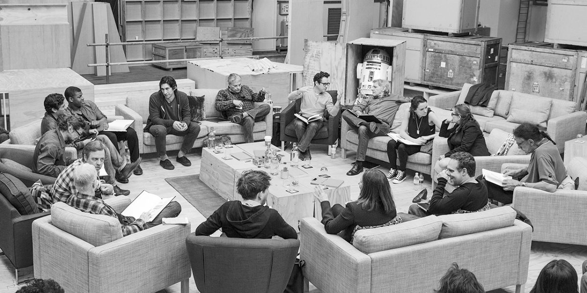 April 29th, Pinewood Studios, UK - Writer/Director/Producer J.J Abrams (top center right) at the cast read-through of Star Wars Episode VII at Pinewood Studios with (clockwise from right) Harrison Ford, Daisy Ridley, Carrie Fisher, Peter Mayhew, Producer Bryan Burk, Lucasfilm President and Producer Kathleen Kennedy, Domhnall Gleeson, Anthony Daniels, Mark Hamill, Andy Serkis, Oscar Isaac, John Boyega, Adam Driver and Writer Lawrence Kasdan. Copyright and Photo Credit: David James.