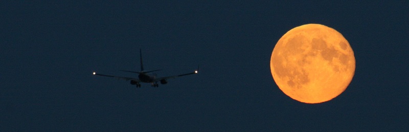 The recent 'supermoon' pictured with a plane over Dublin. Photo Credit: Astronomy Ireland www.astronomy.ie