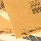 Paris France - February 08 2017: Amazon Prime Parcel Packages closeup. Amazon is an American electronic commerce and cloud computing companybased in Seattle Started as an online bookstore Amazon is become the most importrant retailer in the United States