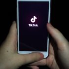A young girl uses the TikTok app on a smartphone. PA Photo. Picture date: Tuesday November 12, 2019. Photo credit should read: Peter Byrne/PA Wire