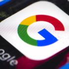 FILE - The Google mobile phone icon, in Philadelphia, April 26, 2017. Big tech companies like Google and Facebook will have to comply with tough rules under a new digital watchdog aimed at giving consumers more choice online or face the threat of big fines. (AP Photo/Matt Rourke, File)