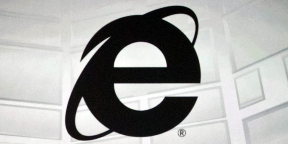 FILE - The Microsoft Internet Explorer logo is projected on a screen during a Microsoft Xbox E3 media briefing in Los Angeles, June 4, 2012. As of Wednesday, June 15, 2022, Microsoft will no longer support the once-dominant browser that legions of web surfers loved to hate and a few still claim to adore. (AP Photo/Damian Dovarganes, File)