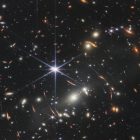 This image provided by NASA on Monday, July 11, 2022, shows galaxy cluster SMACS 0723, captured by the James Webb Space Telescope. The telescope is designed to peer back so far that scientists can get a glimpse of the dawn of the universe about 13.7 billion years ago and zoom in on closer cosmic objects, even our own solar system, with sharper focus. (NASA/ESA/CSA via AP)