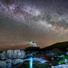 The core of the Milky Way becomes visible in the early hours of Tuesday morning as it moves over Bamburgh Lighthouse at stag Rock in Northumberland. Picture date: Tuesday April 13, 2021.