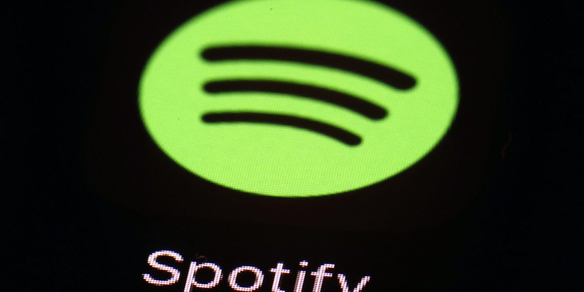 FILE - The Spotify app on an iPad is pictured, March 20, 2018, in Baltimore. Heardle, the name-that-tune game inspired by the Wordle craze, is being dropped by Spotify less than a year after the music-streaming giant acquired it. “After careful consideration, we have made the difficult decision to say goodbye to Heardle," Spotify said in a statement, Saturday, April 15, 2023. (AP Photo/Patrick Semansky, File)
